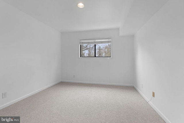 unfurnished room with baseboards, recessed lighting, and carpet flooring