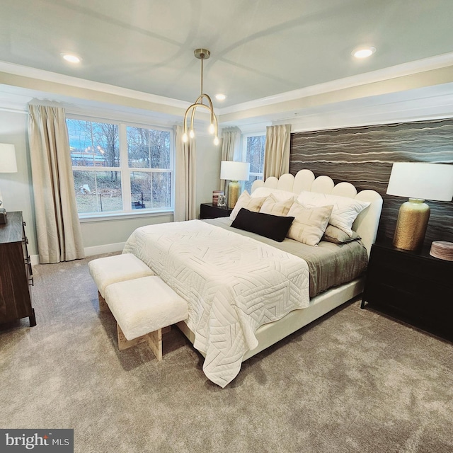 bedroom featuring crown molding and carpet