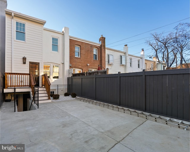 back of house with a patio area