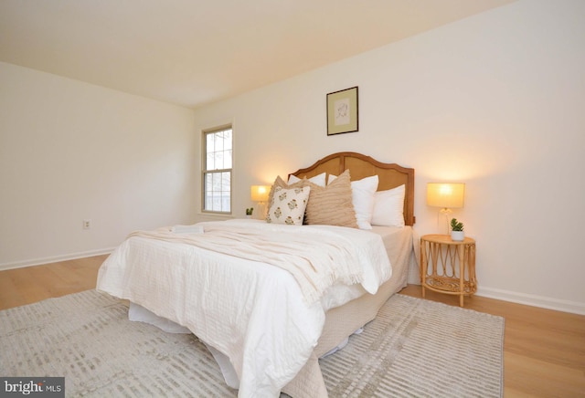 bedroom featuring light wood-type flooring