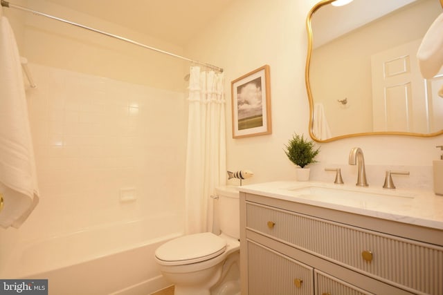 full bathroom with vanity, shower / bath combination with curtain, and toilet