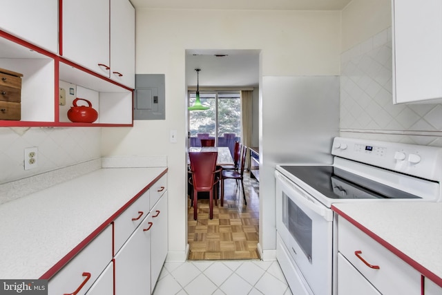 kitchen featuring white electric stove, electric panel, white cabinets, and light parquet flooring