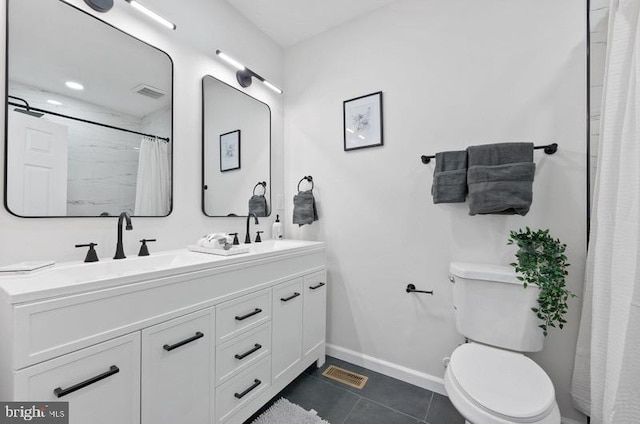 bathroom featuring visible vents, tile patterned floors, toilet, and baseboards