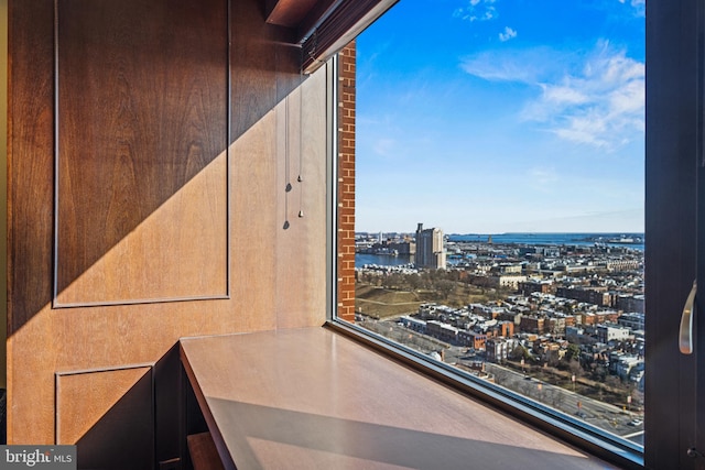 balcony with a city view and a water view