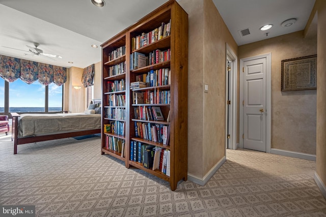 bedroom with baseboards, visible vents, and recessed lighting