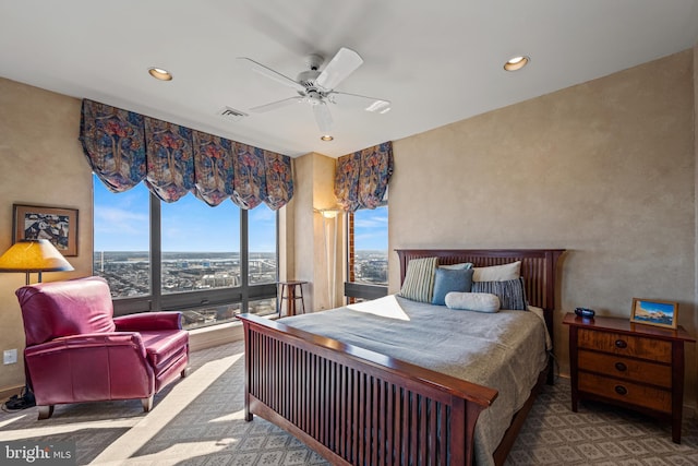 bedroom featuring a ceiling fan, visible vents, and recessed lighting