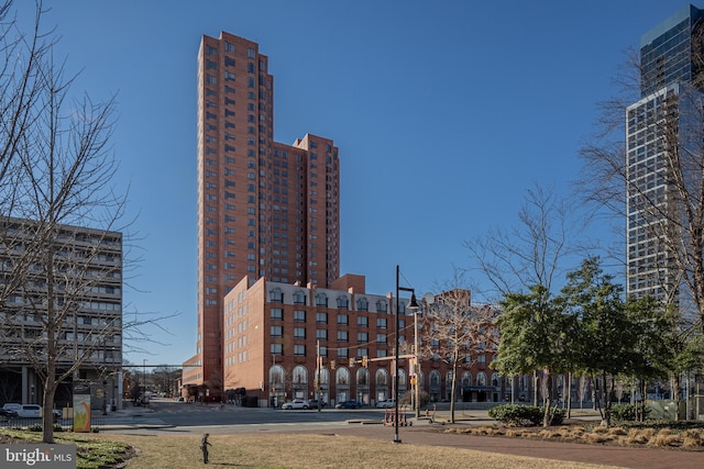 view of building exterior featuring a city view