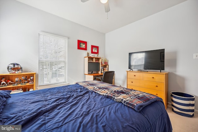 bedroom with ceiling fan and carpet