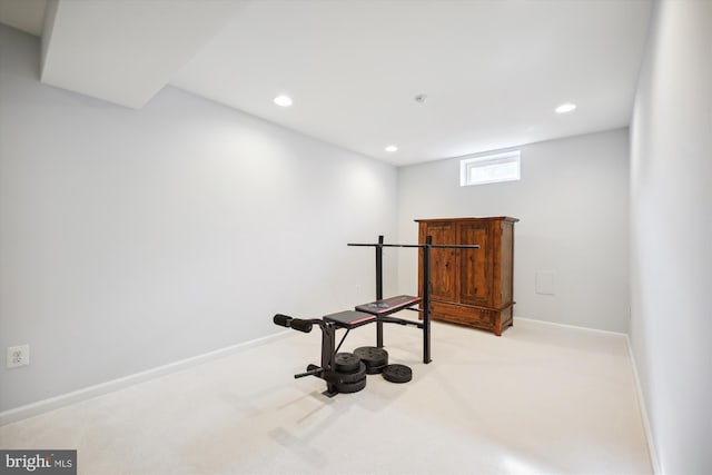 workout room featuring recessed lighting, light colored carpet, and baseboards