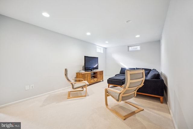 living area with recessed lighting, carpet, and baseboards