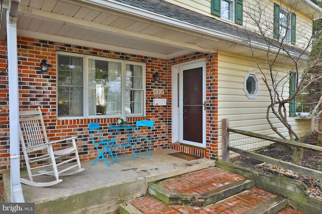 entrance to property with covered porch