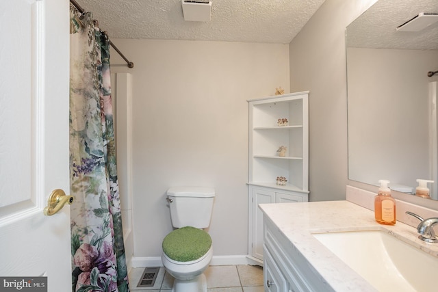 full bathroom with tile patterned floors, toilet, a textured ceiling, vanity, and shower / bath combination with curtain