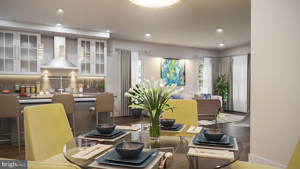 dining area featuring dark wood-type flooring