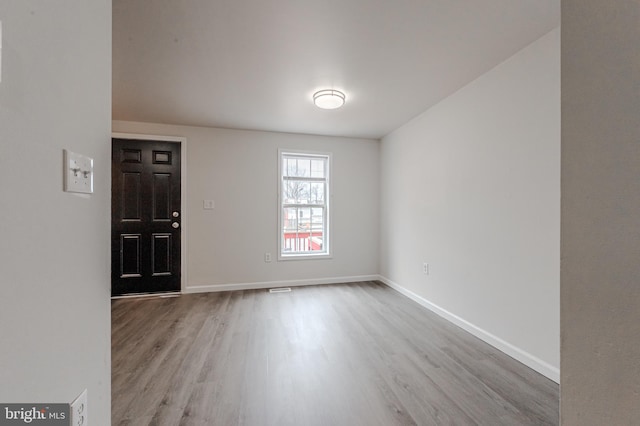 empty room featuring light hardwood / wood-style floors