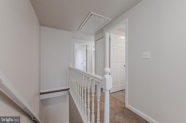 corridor featuring carpet