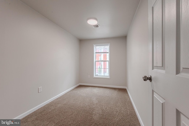 view of carpeted spare room