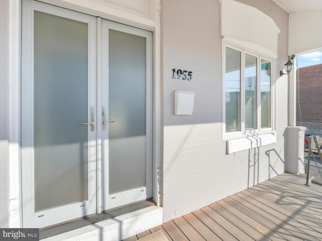 doorway to property featuring french doors