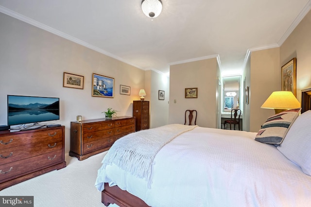 bedroom featuring ornamental molding and light carpet