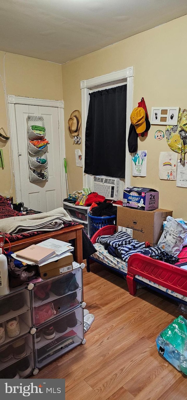 bedroom featuring hardwood / wood-style flooring