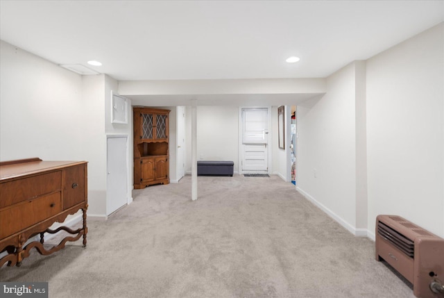 interior space with light carpet, baseboards, and recessed lighting