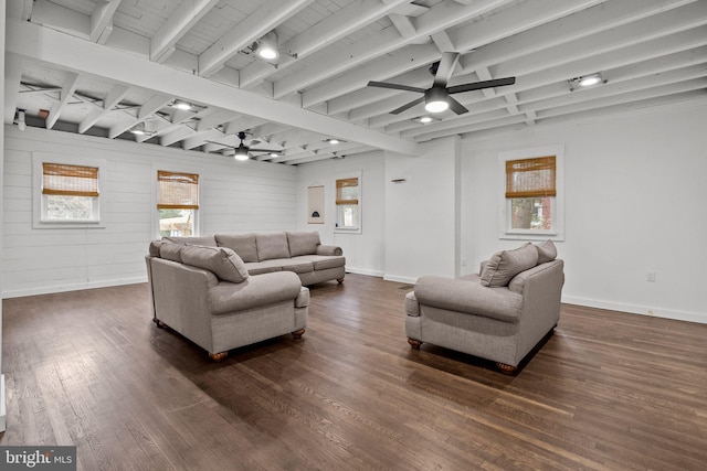 living room with dark hardwood / wood-style flooring, beam ceiling, and ceiling fan