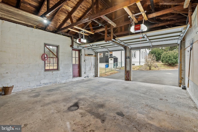 garage featuring a garage door opener