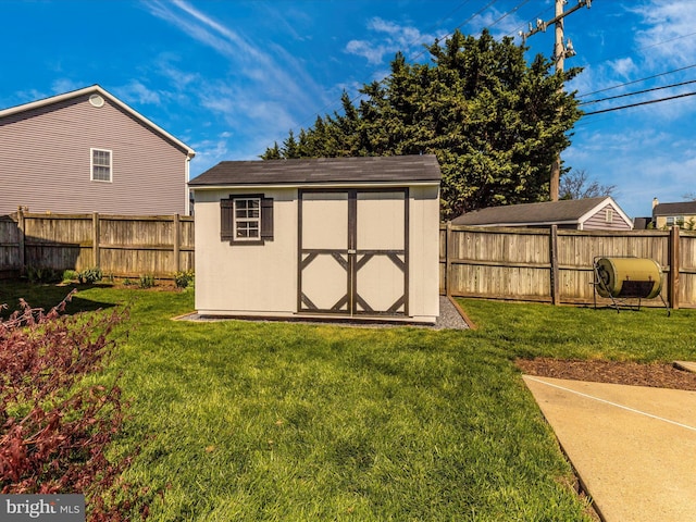 view of outbuilding featuring a yard