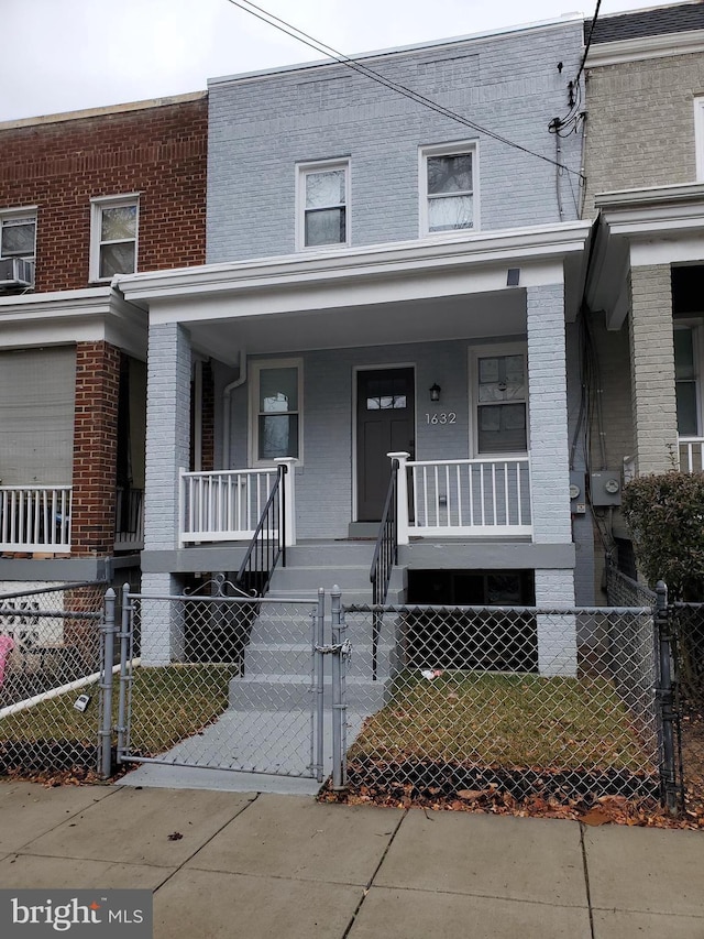 view of property featuring a porch