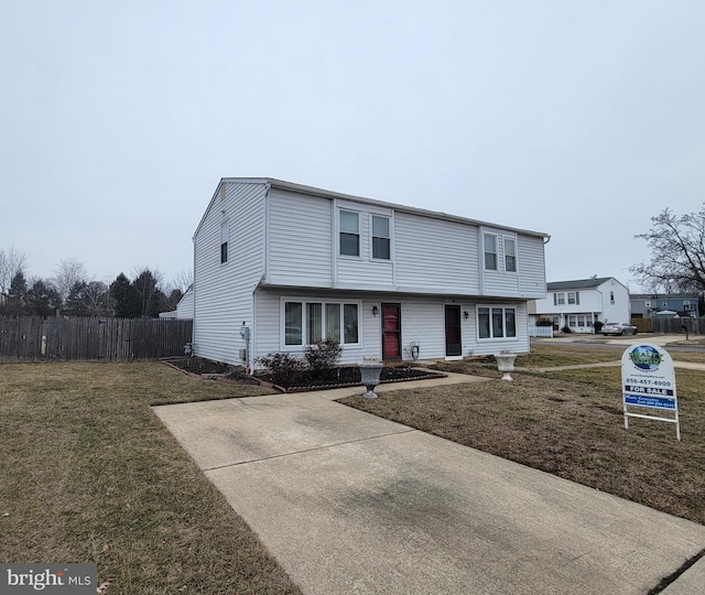 view of front of property with a front lawn