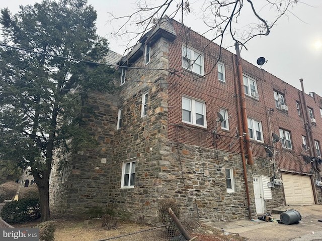 view of building exterior with a garage