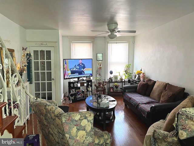 living room featuring hardwood / wood-style flooring and ceiling fan