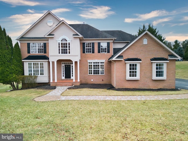 view of front of home with a front yard