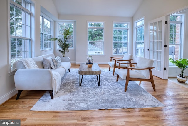 sunroom / solarium with vaulted ceiling