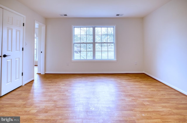 empty room featuring light wood-type flooring