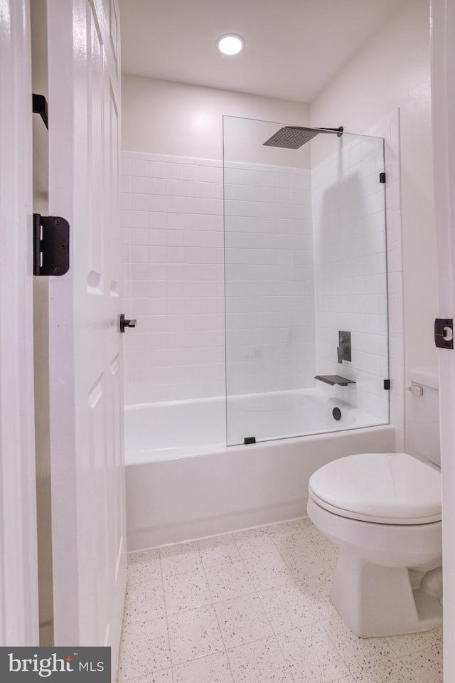 bathroom with shower / tub combination and toilet