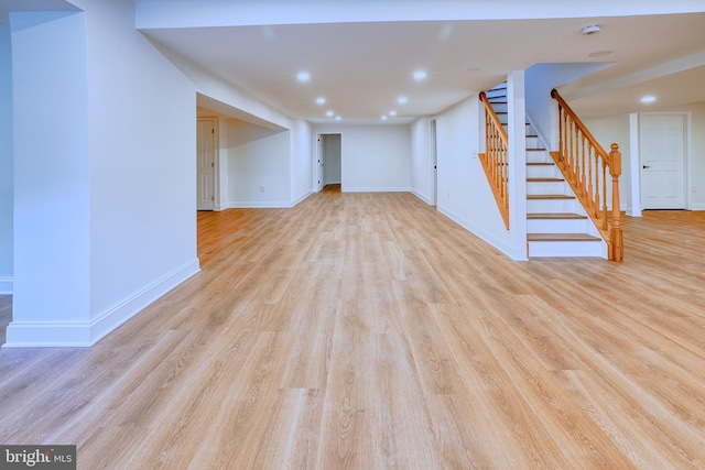 unfurnished living room featuring light hardwood / wood-style flooring