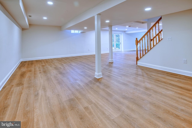 basement featuring light hardwood / wood-style floors