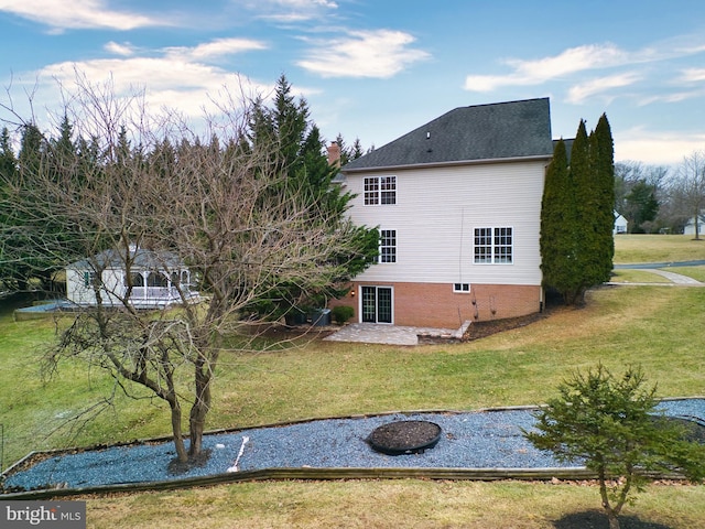 view of property exterior featuring a yard