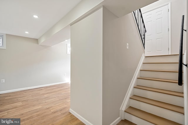 stairway with wood-type flooring