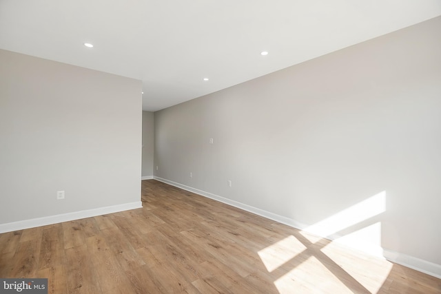 unfurnished room featuring light wood-type flooring