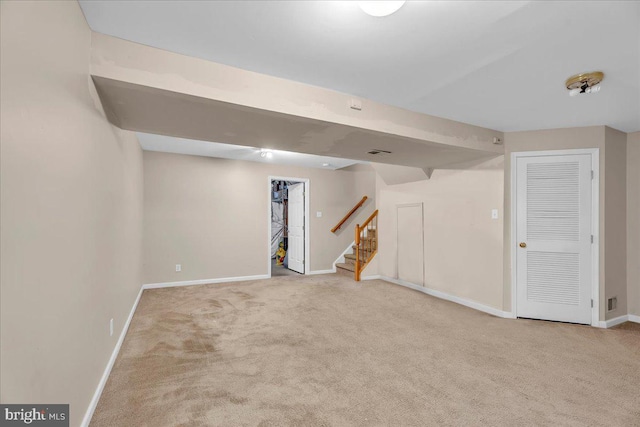 basement with light carpet