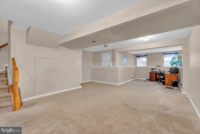 basement with light colored carpet