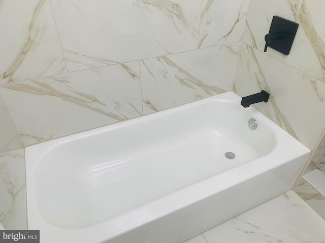 bathroom with a bathing tub