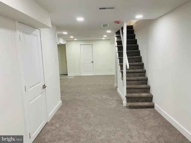 basement with light carpet