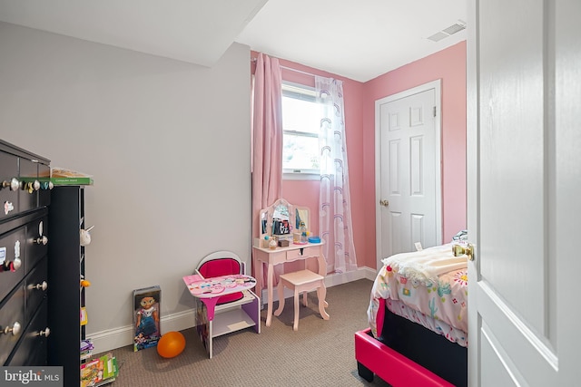 bedroom featuring carpet