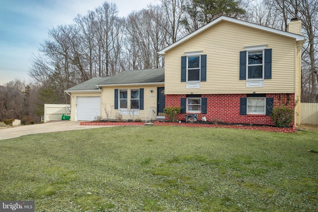 split level home featuring a front yard and a garage