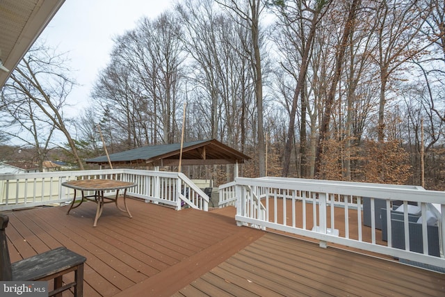 wooden deck with a gazebo