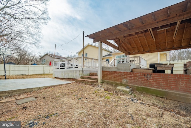 view of yard with a patio and a deck