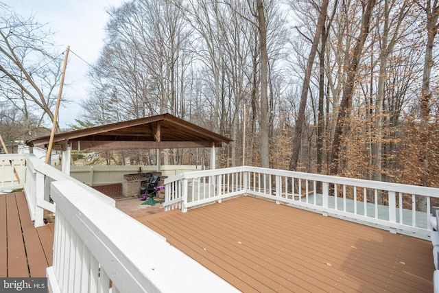 wooden deck featuring a gazebo