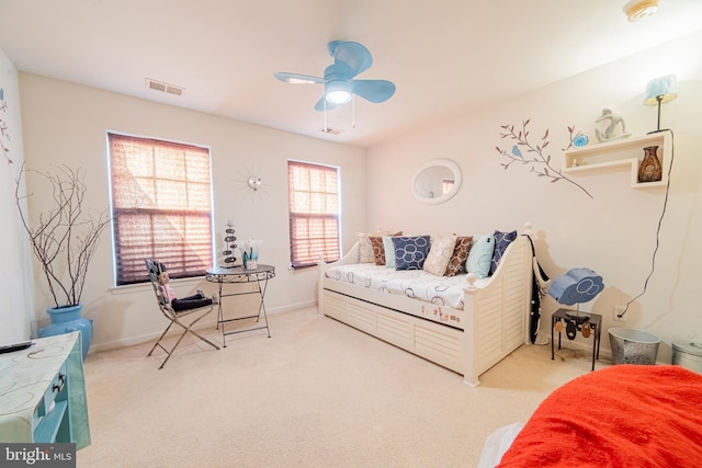 bedroom with ceiling fan and carpet